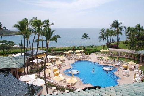 Shot of a pool by the beach