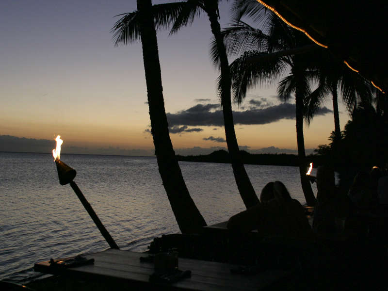 Touch burning at sunset on Kauai