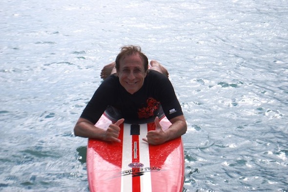 Bruce Fisher on a surfboard