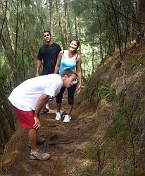 Hikers taking a break after climbing to the top of Kuliouou trail