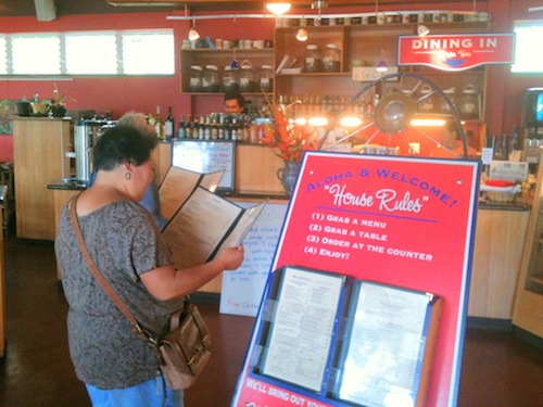 A menu board in front of the ordering counter
