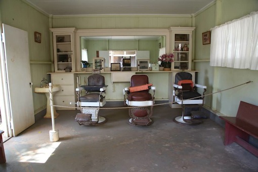 Three historic dentist chairs on display at the Hawaii Plantation Village