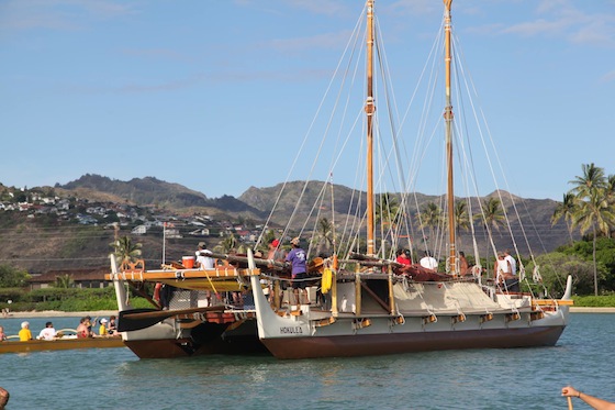 Hawaiian voyaging canoe the Hokulea sailing through a Honolulu bay