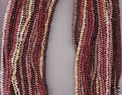 Multi-strand Niihau shell lei on display