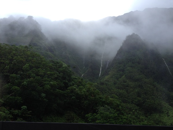 Waterfalls and low-lying clouds in Koolau Mountain range