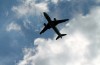plane flying in the clouds