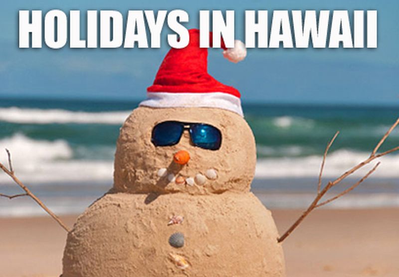 snowman made of San on the beach in Hawaii