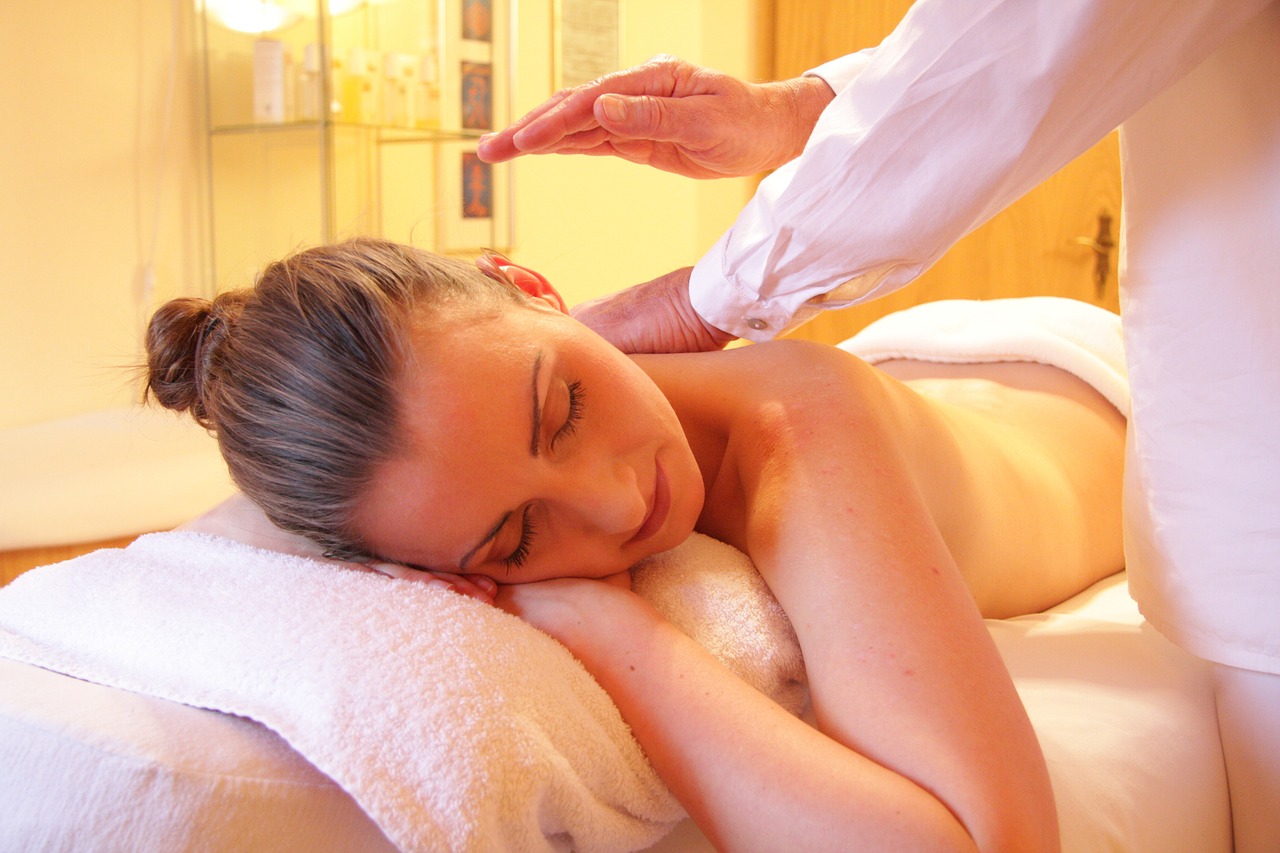 Woman reciving a massage at a spa in Hawaii