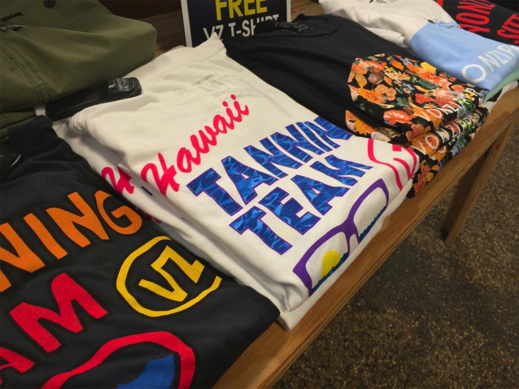 A table filled with local style t-shirts