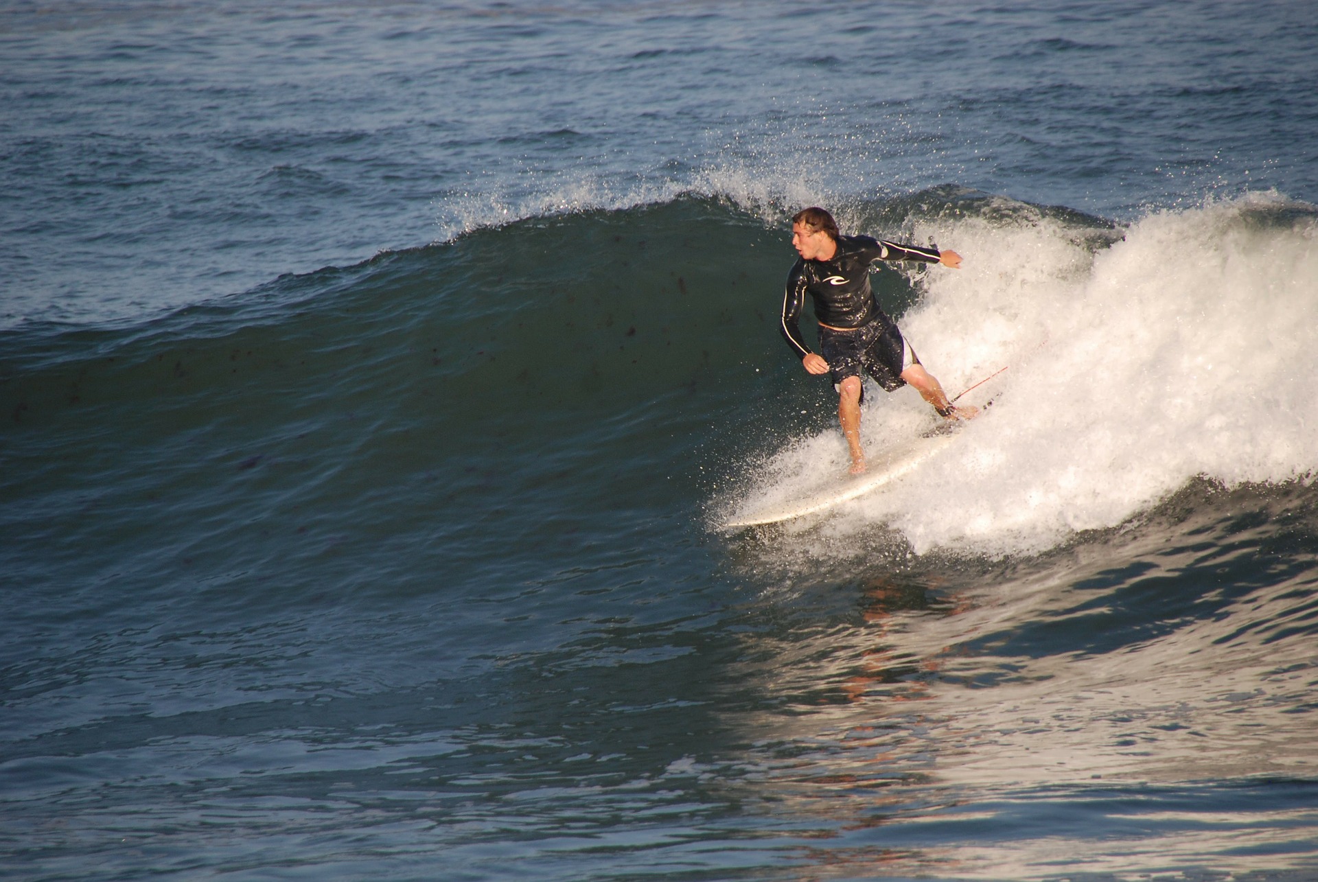 A surfer riding a wave