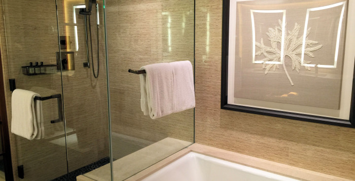 Soaking tub and shower at the Menele Bay on Lanai