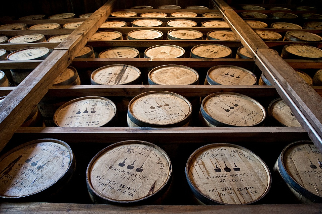 A wall of barrels filled with bourbon