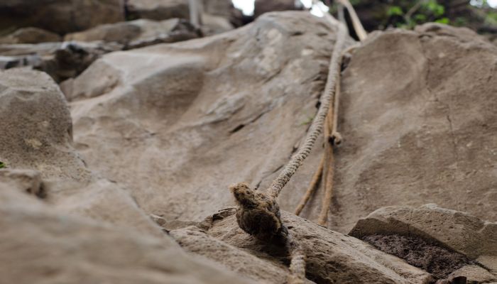 Climbing rope on Olomama Three Peaks Hike