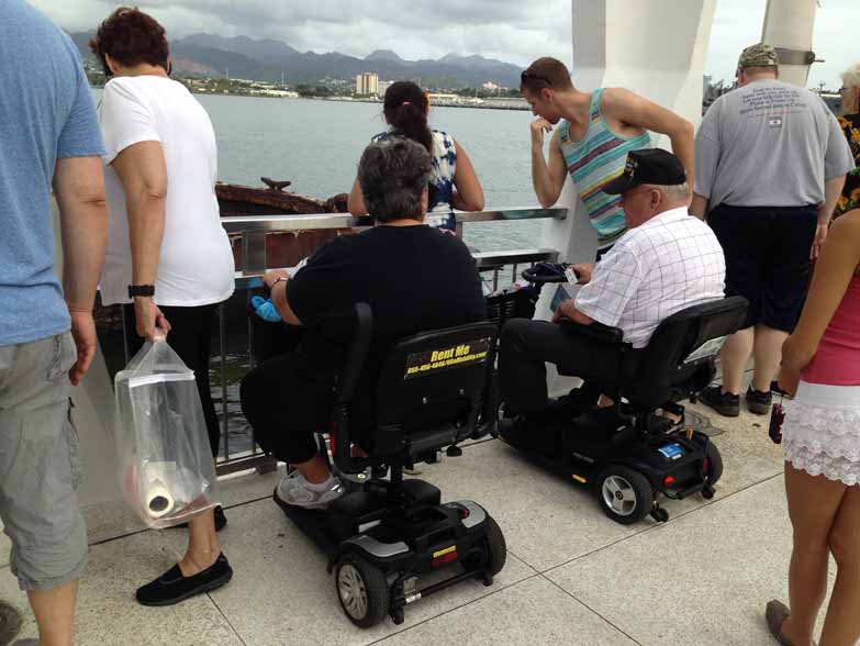 People in wheelchairs at Pearl Harbor