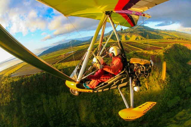 two people in a powered hang glider