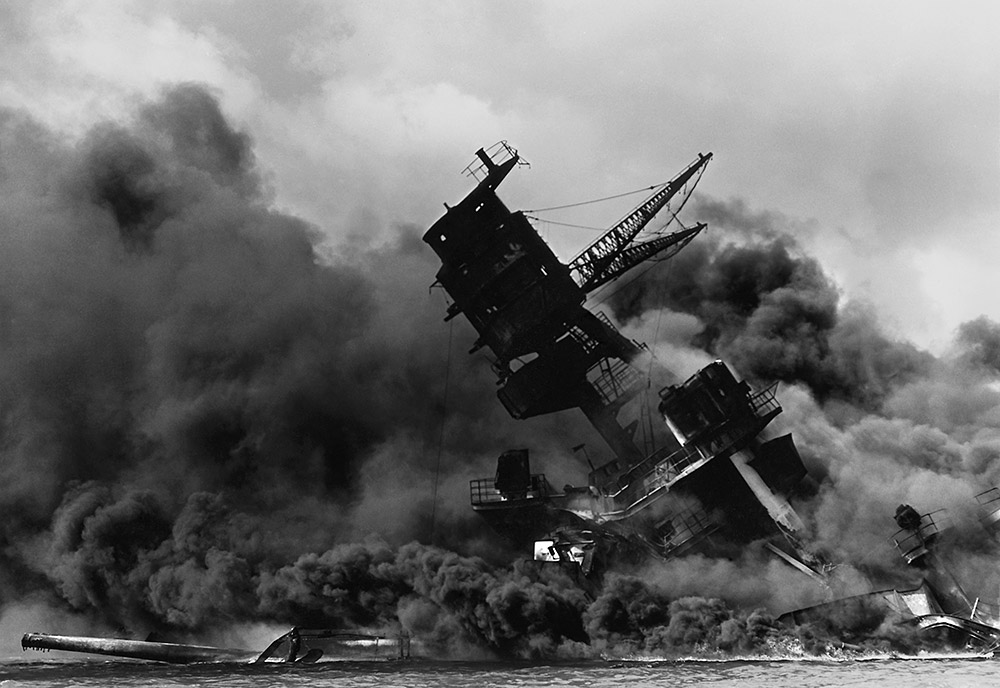 a vintage photograph of a bomb exploding the uss arizona