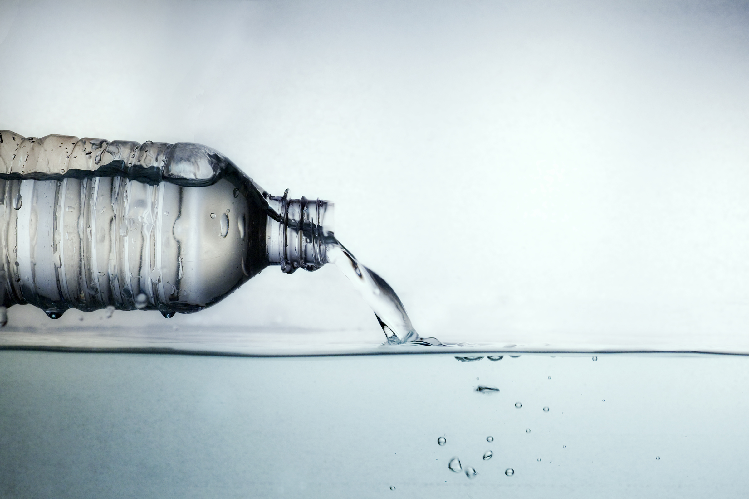 bottled water pouring water
