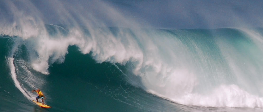 a surfer surfing a big wave
