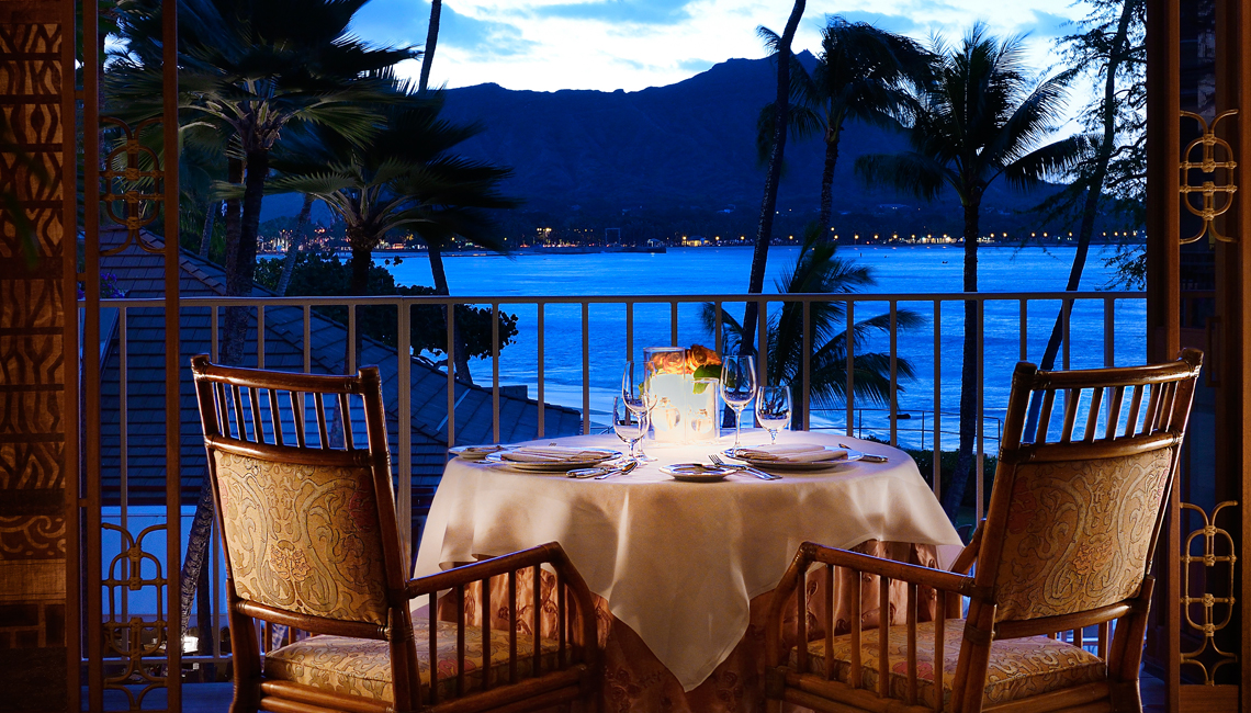 a table at a restaurant with an ocean view