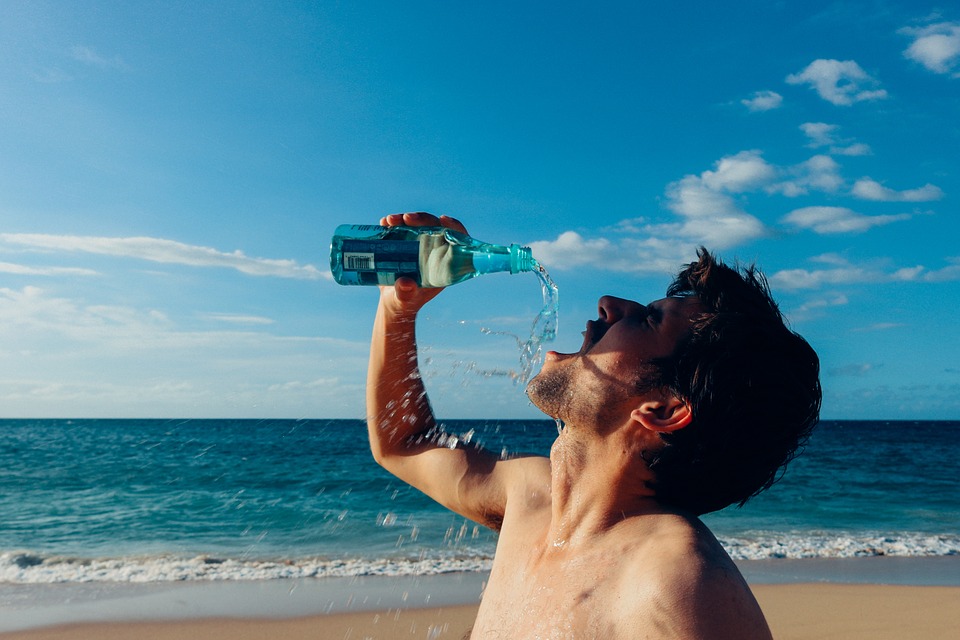 a man drinking water