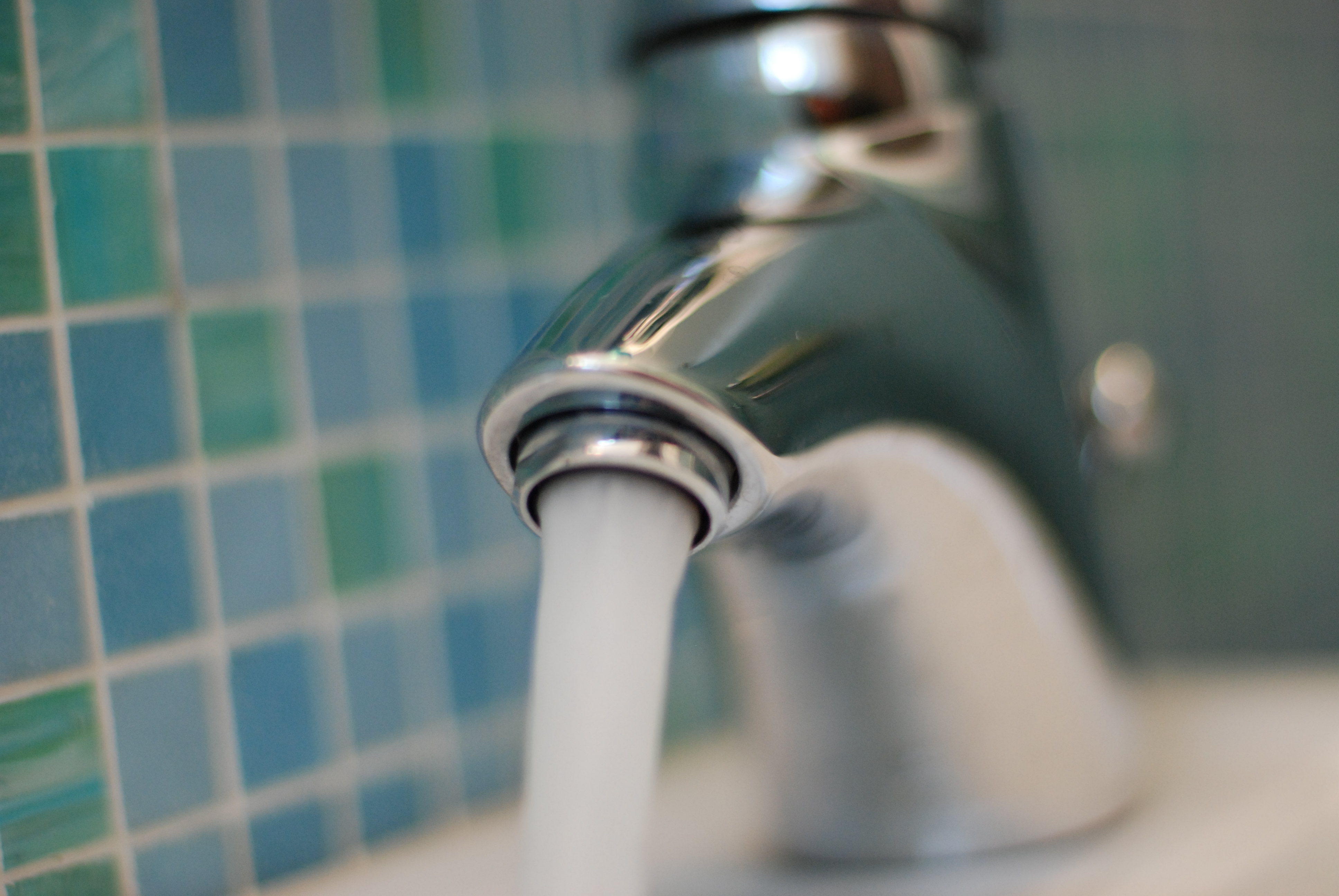 water coming out of a faucet