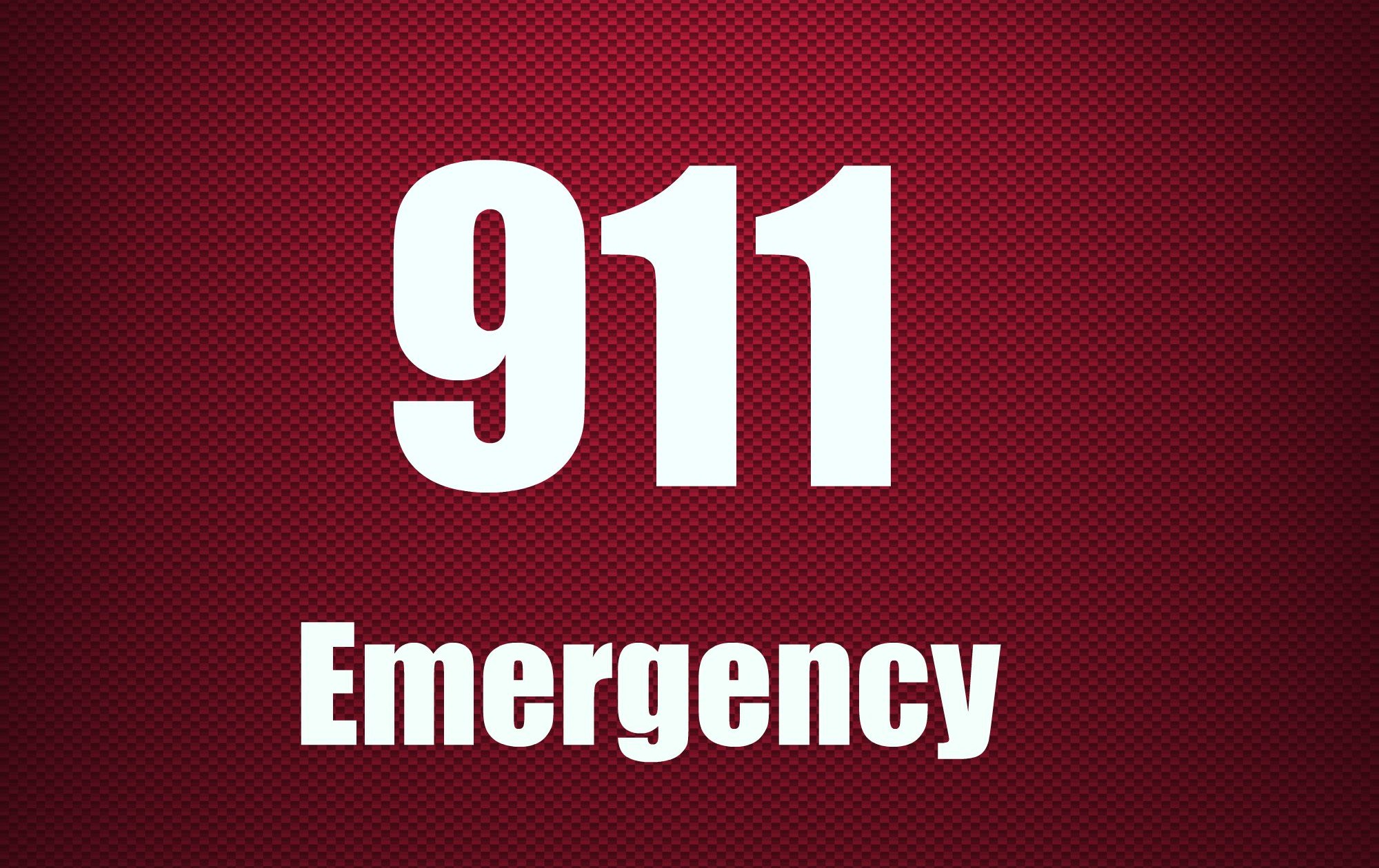 a sign saying 911 emergency