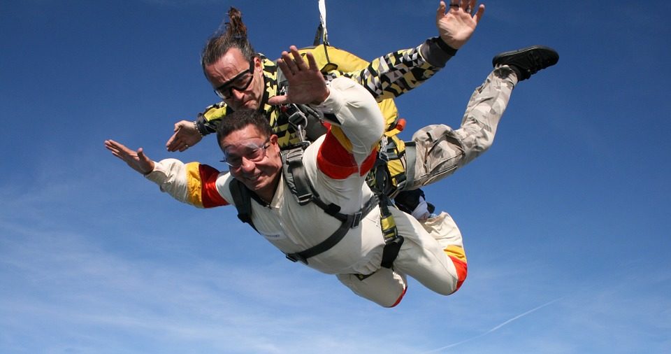 a tandem skydiving jump in mid-air