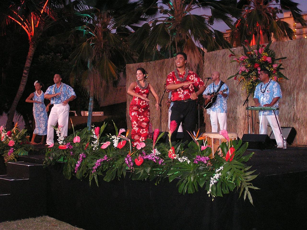 hula dancers performing on a stage