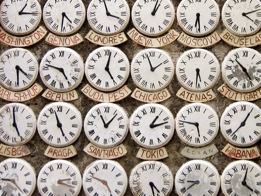 a wall of clocks
