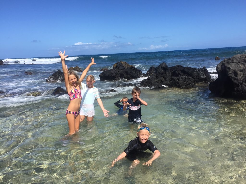 kids in a series of tide pools