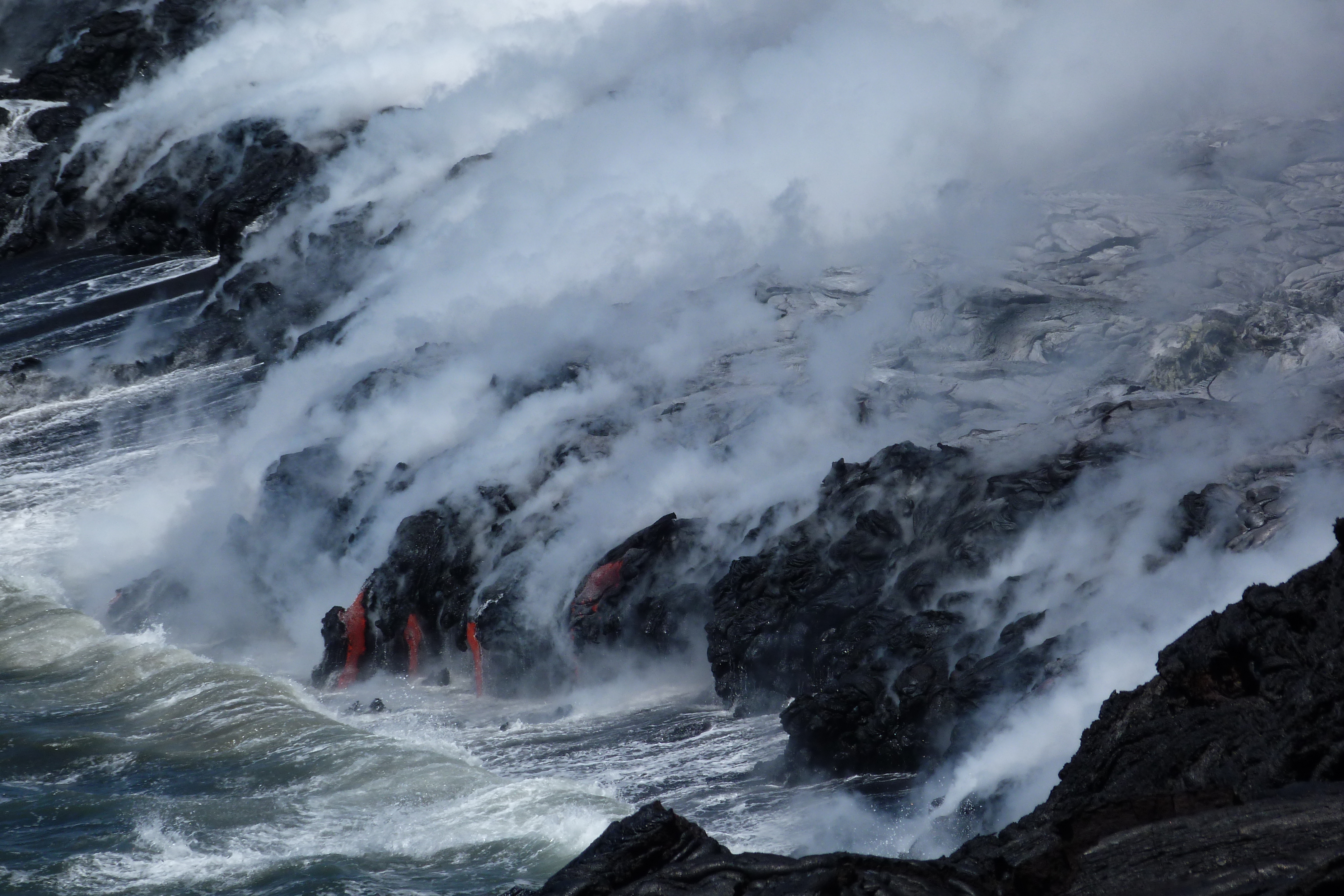 lava entering the ocean on the big island of hawaii