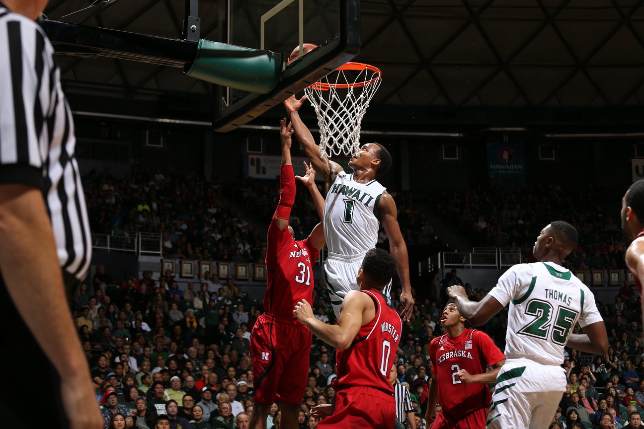 basketball players at the basketball hoop