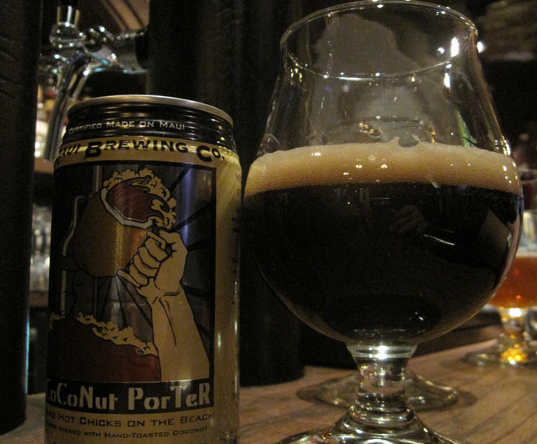a beer with beer in a glass