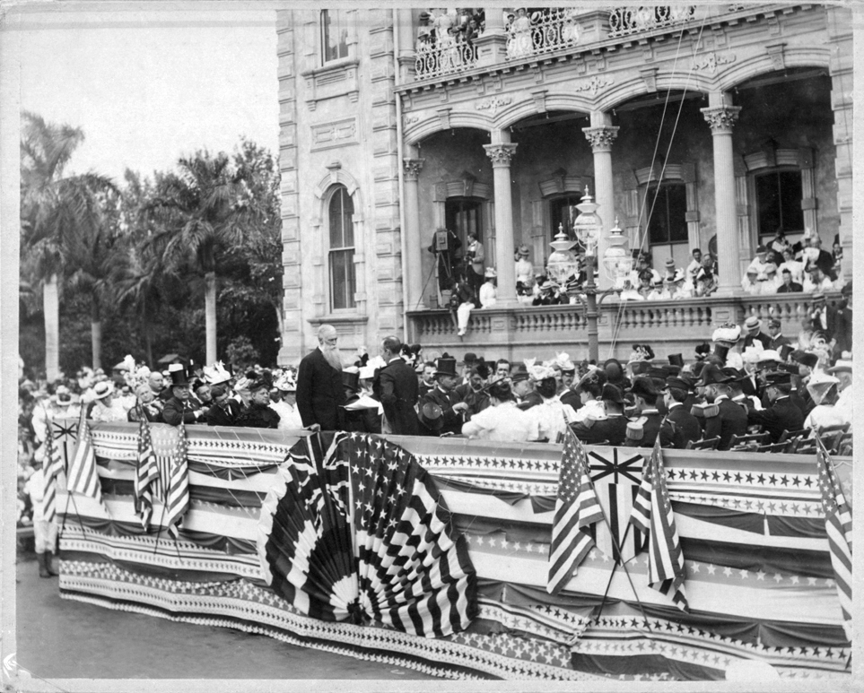 a black and white photo of a man being sworn in as governor