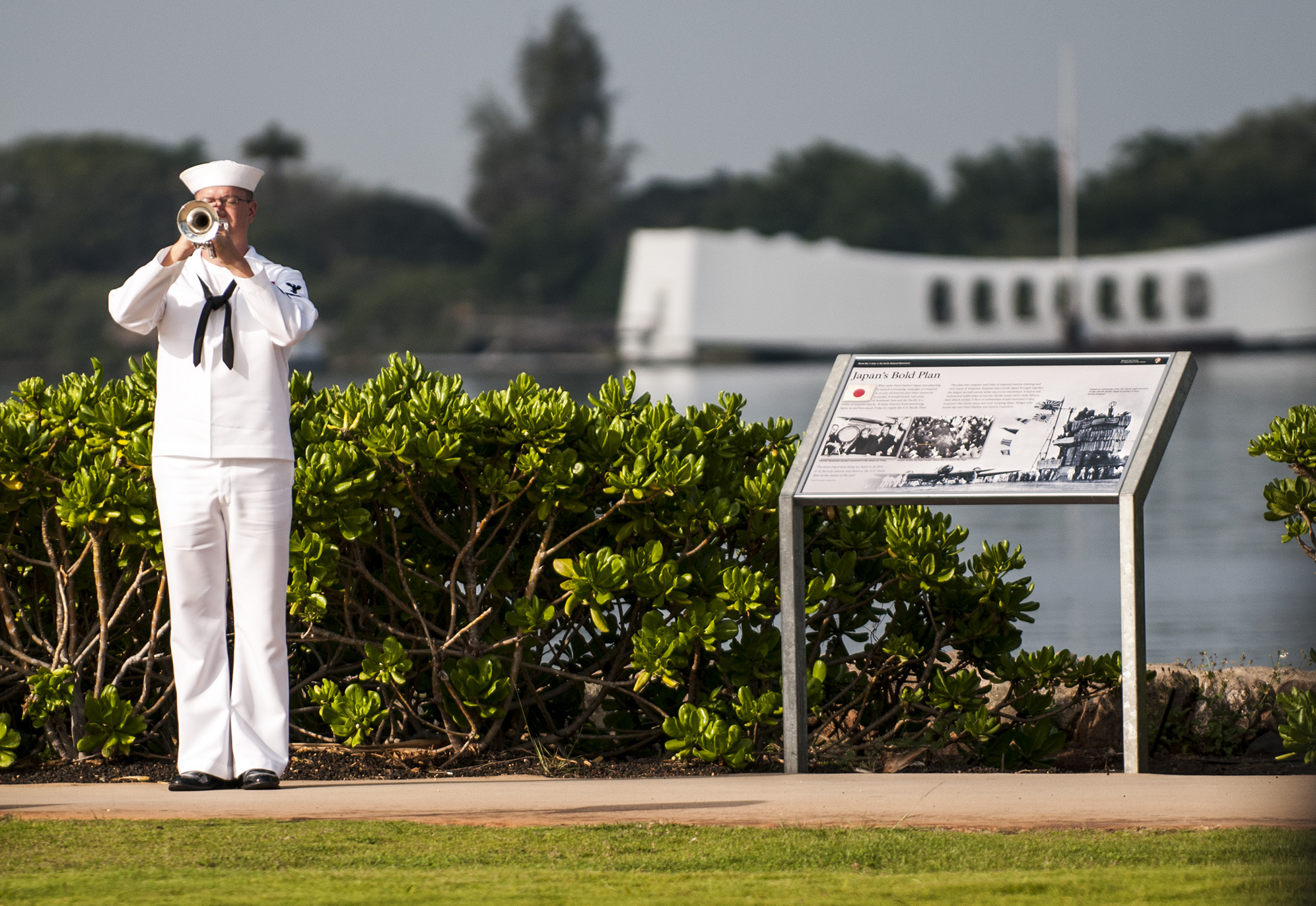 a sailor playing the trumpet