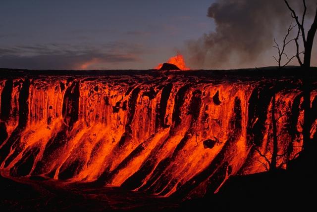 Lava cascading over a cliff