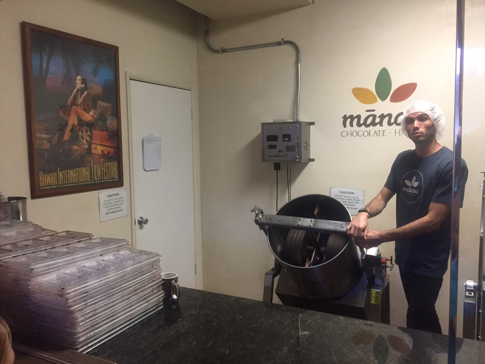 a man showing how to make chocolate