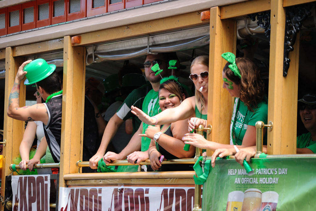 People dressed in green in trolley