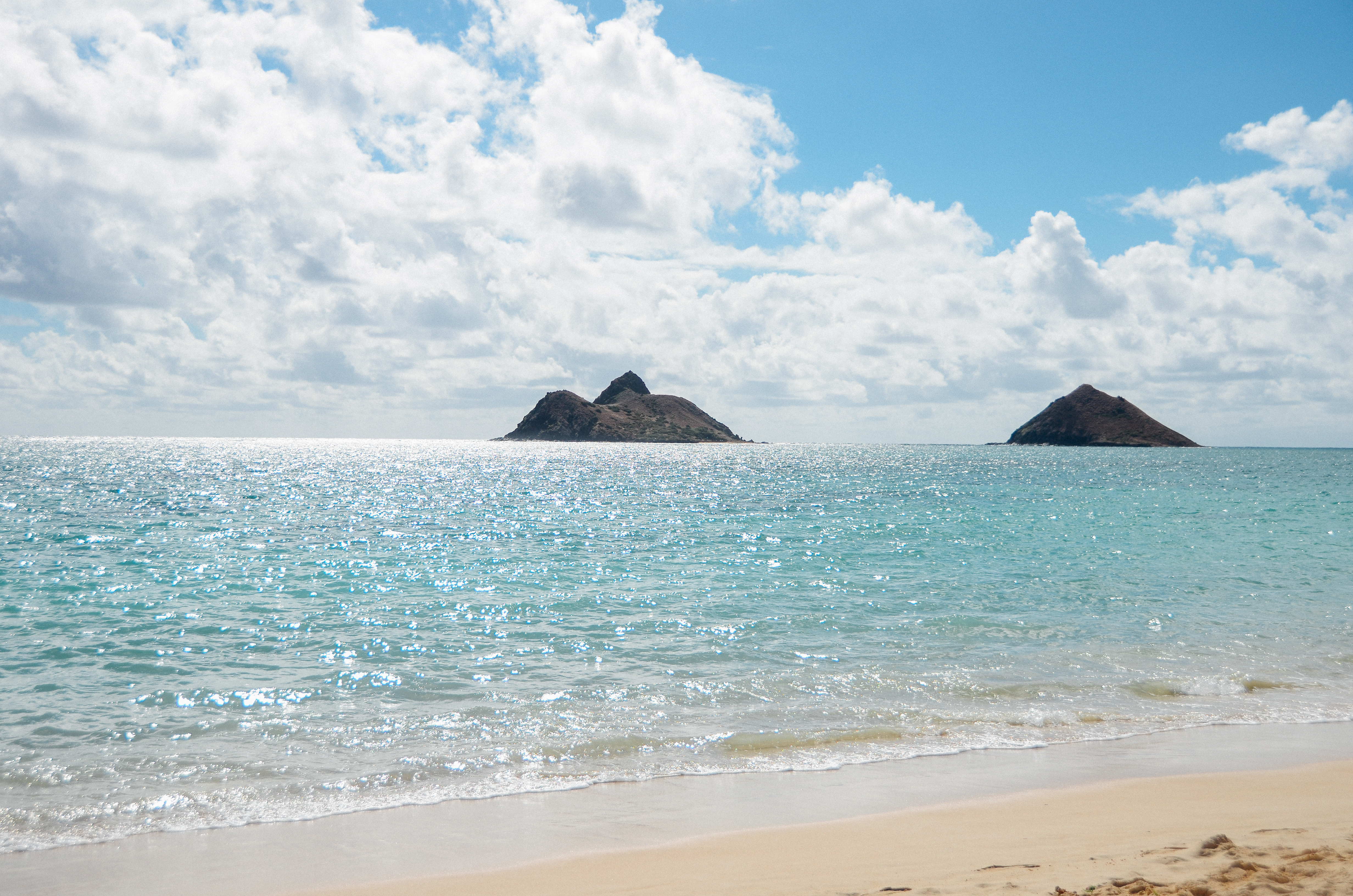 The view of the Mokulua Islands from Lanikai Beach. You can kayak to Moku Nui, the island on the left.