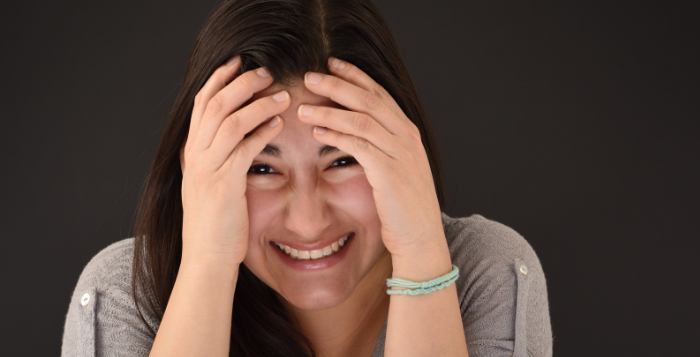 Woman making mistake facial expression