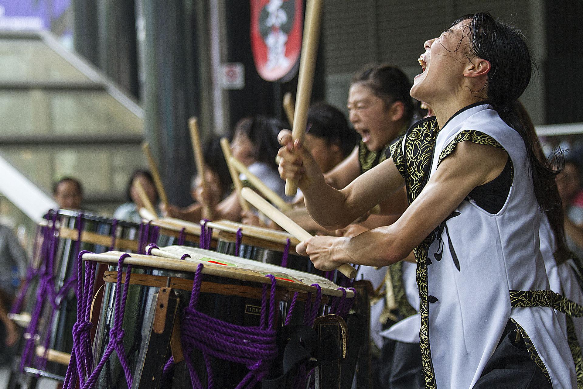 Female Asian drummers performing