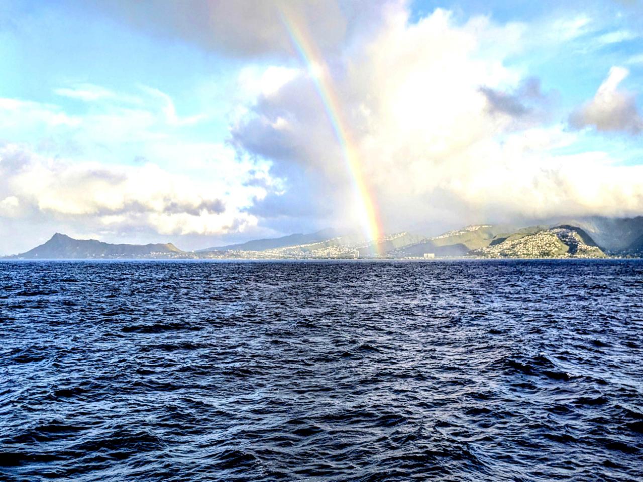 Hawaii Rainbow forming over the ocean in Hawaii
