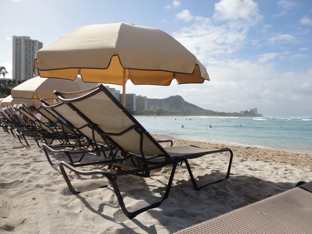 Umbrella and chairs on Waikiki Beach provided by Waikiki Beach Services 