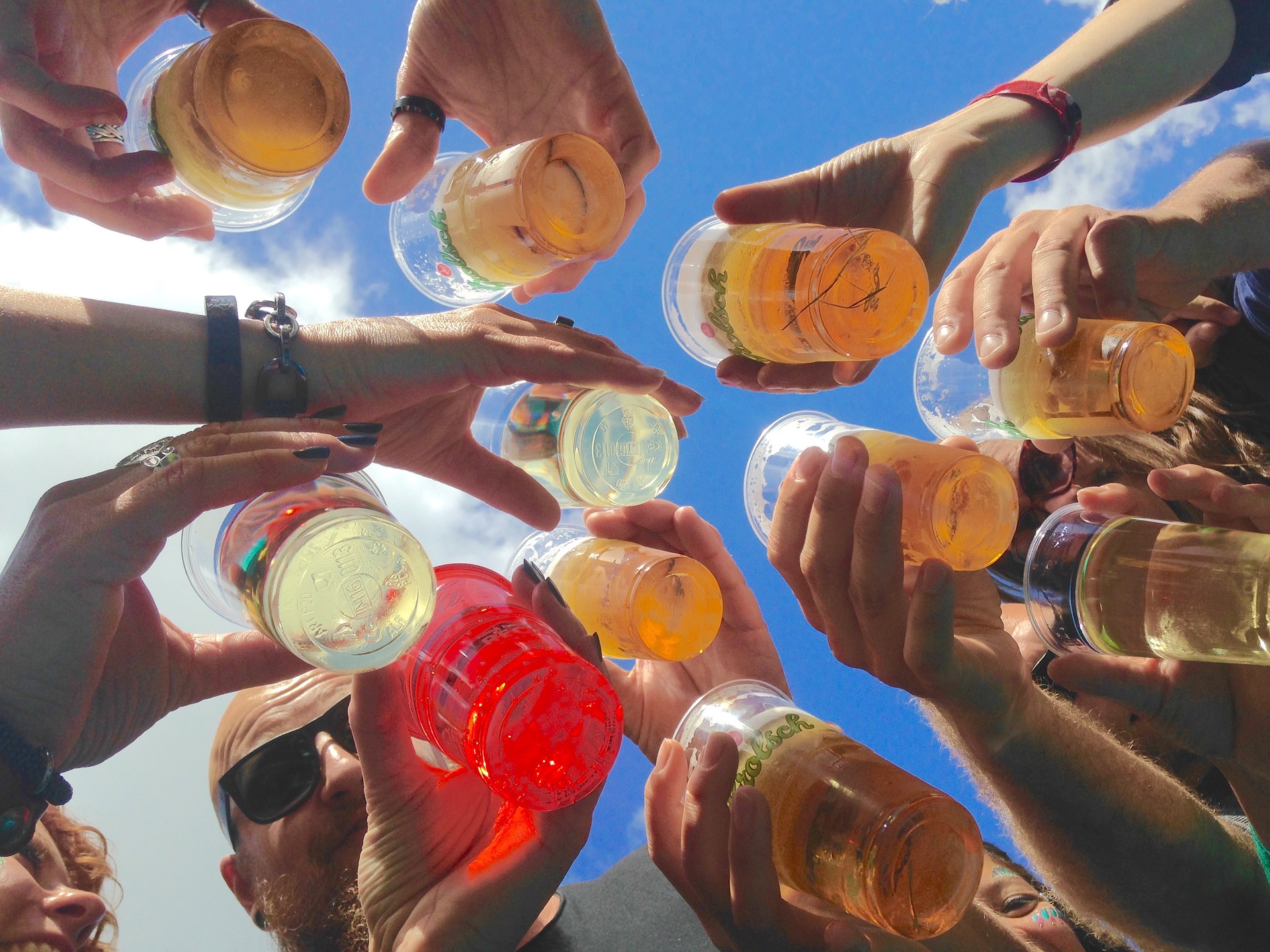 People with beer cups filled