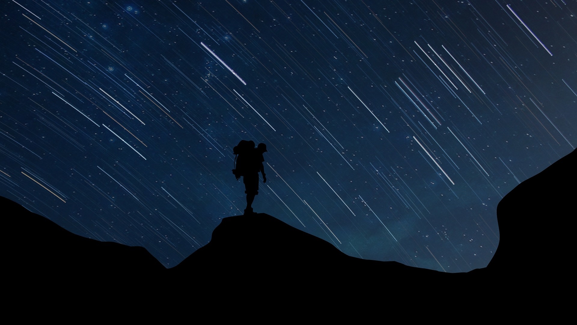 Time lapse stars and hiker