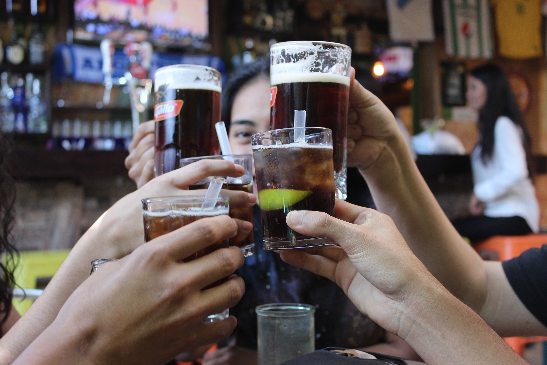 Friends toasting pub crawl