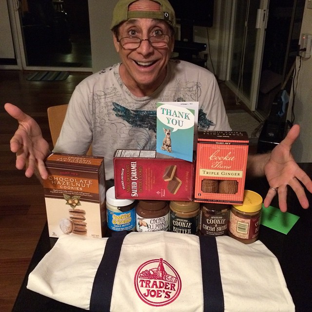 Trader Joe's in Hawaii man posing wiht trader joe's products on a table