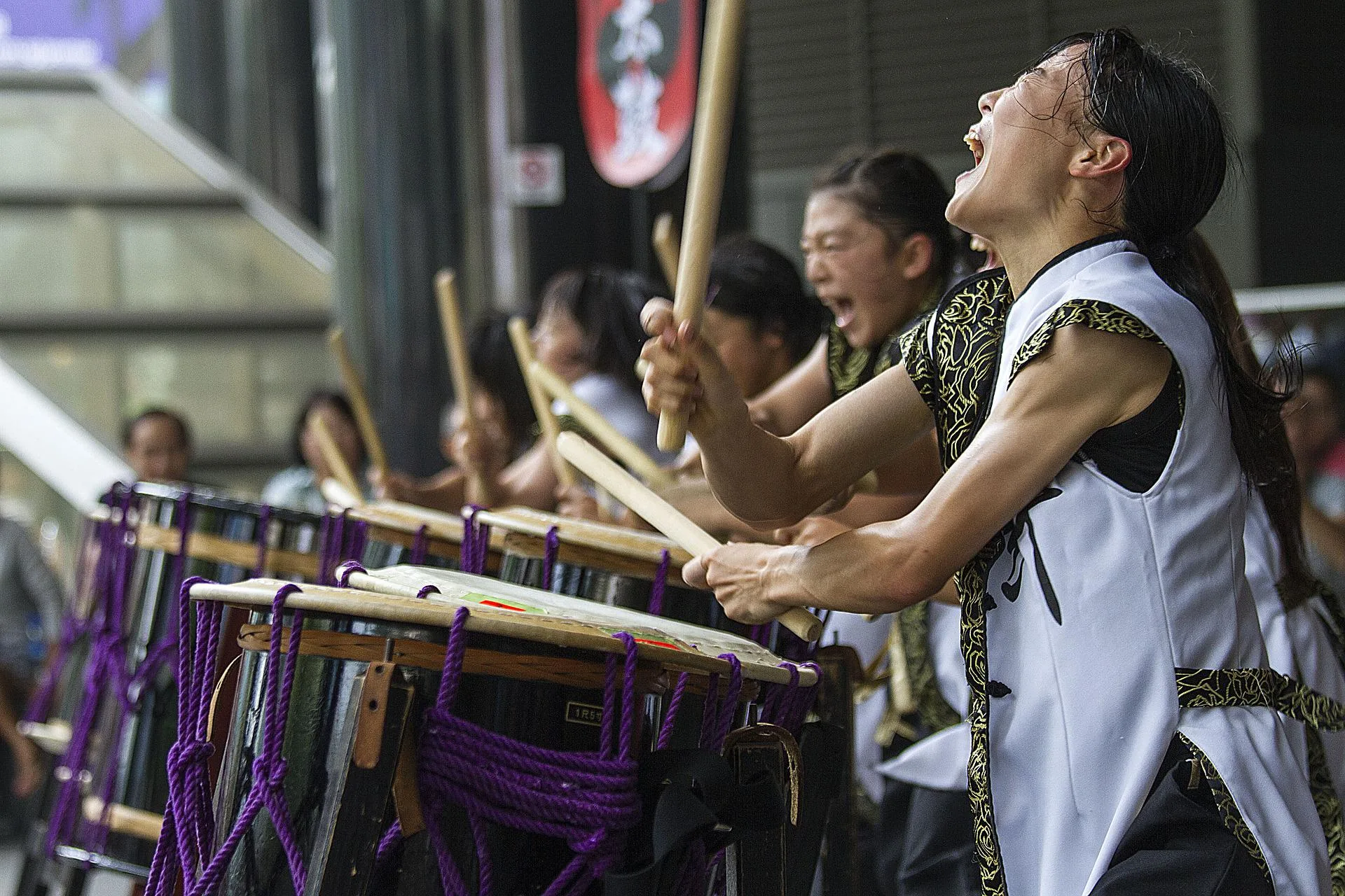 Female Asian drummers performing