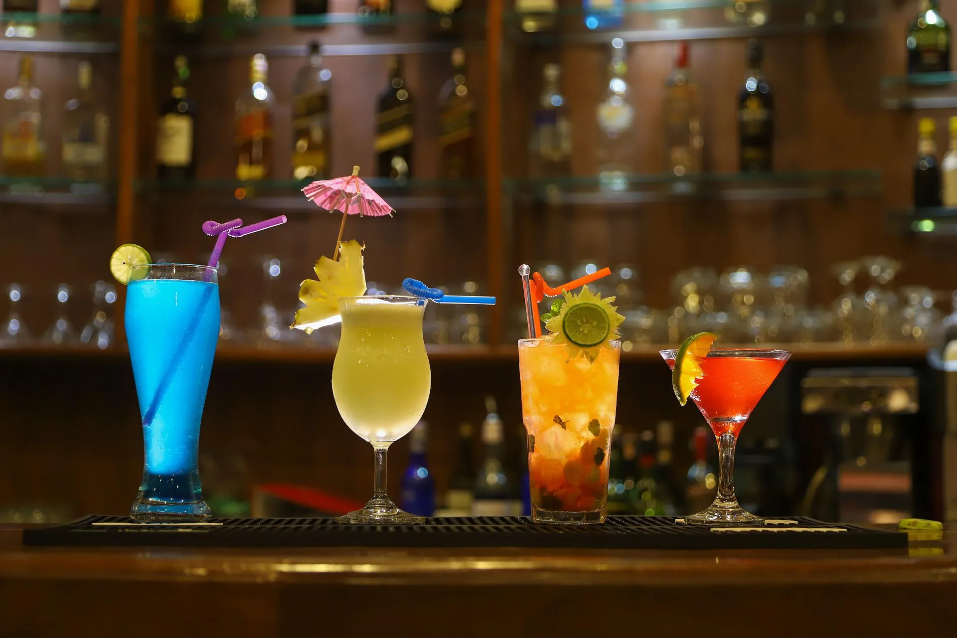 Colorful fancy cocktails lined up at Hawaii sport bar